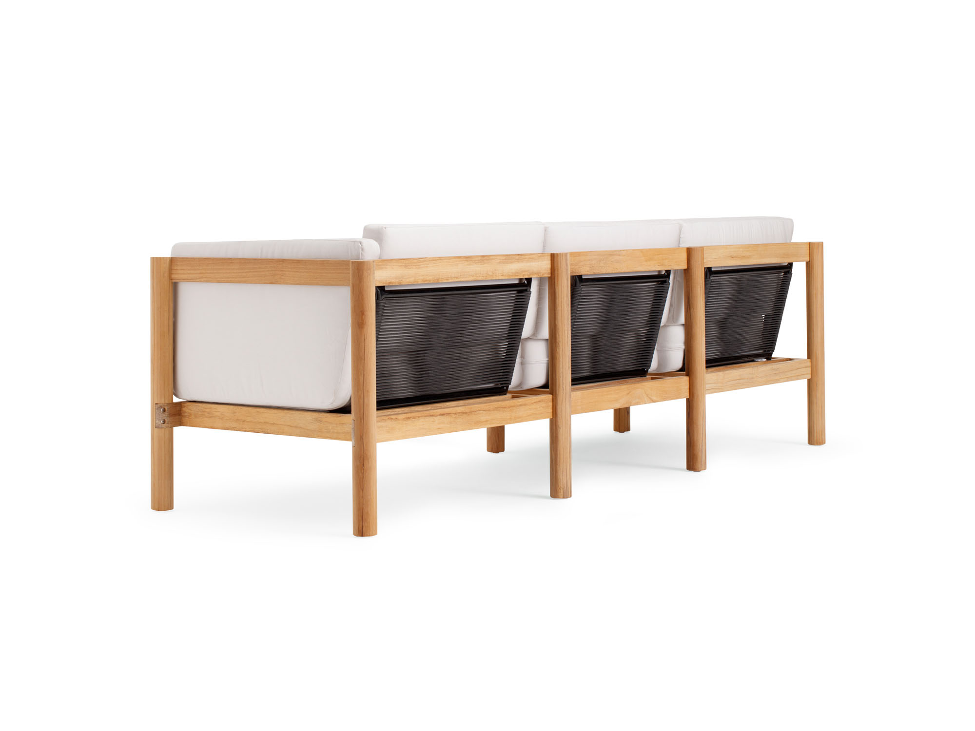 Back angle view of outdoor sofa with white arm cushions